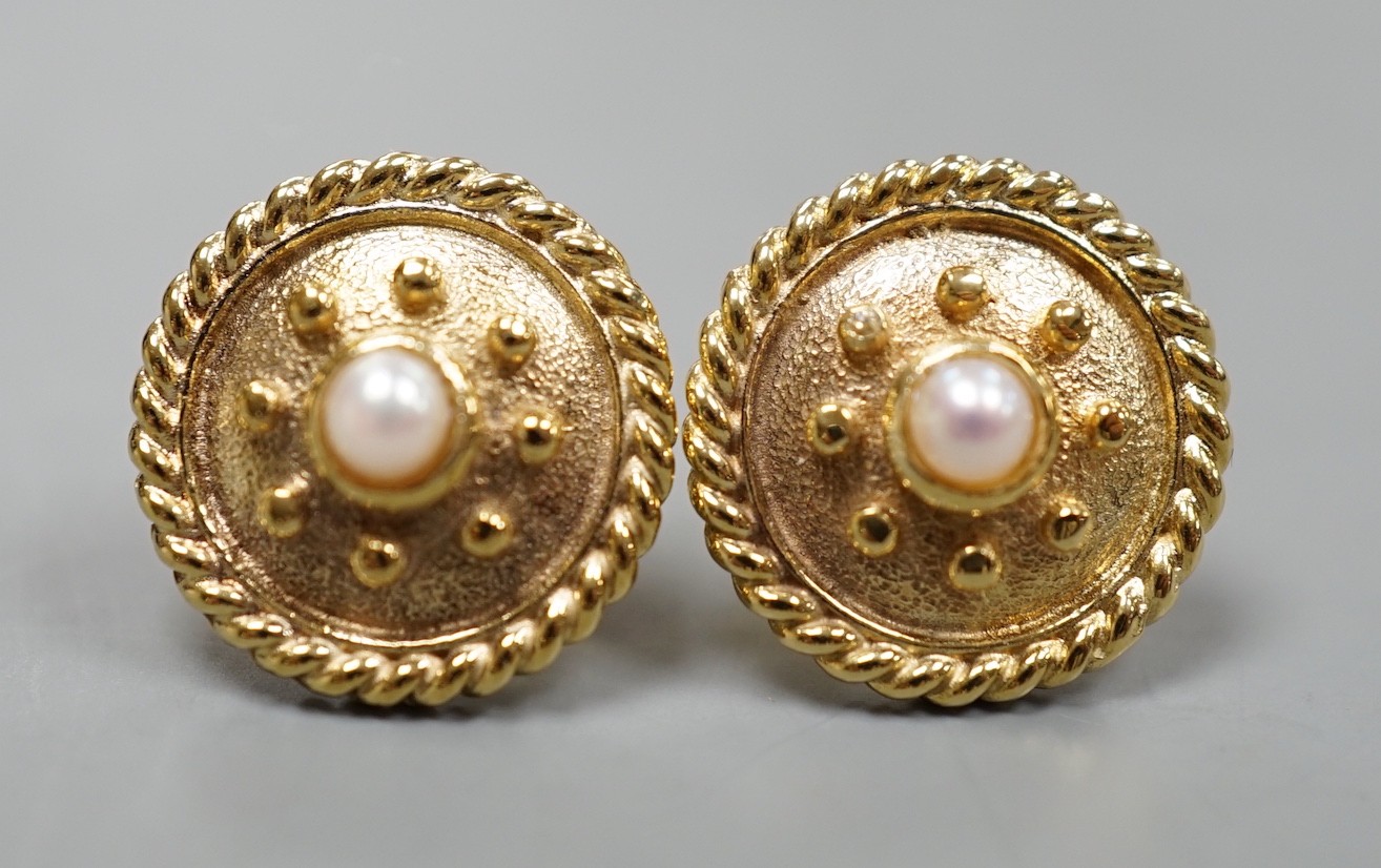 A modern pair of 585 yellow metal and cultured pearl set disc earrings, 14mm, gross weight 6.3 grams.